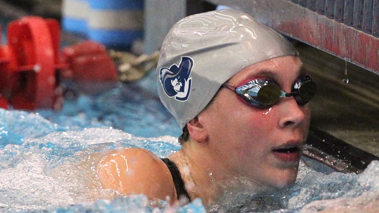 Conners freestyles Xavier to swimming success